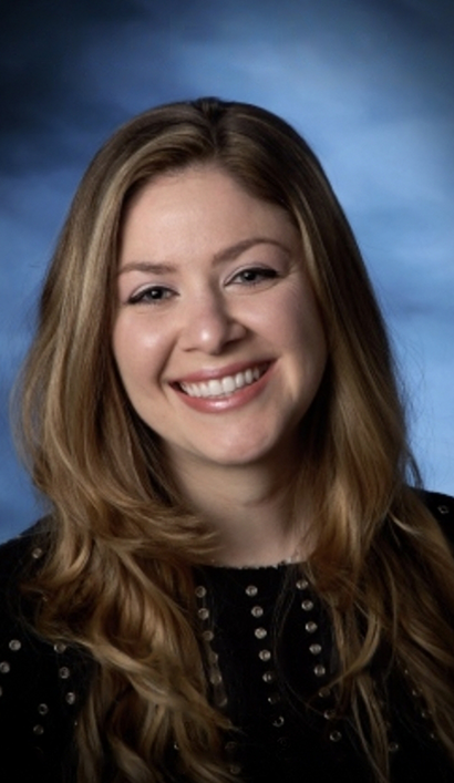 Peabody dentist Doctor Romy Conroyd smiling